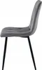 A side view of a gray velvet upholstered chair with black metal legs. Anteprima dell’immagine prodotto