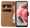 A brown flip case for a smartphone, showing credit cards and a banknote inside. Produktbild-Vorschau