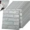 A woman is applying a 3D brick-effect wall panel to a wall, with a stack of panels in the foreground. Produktbild-Vorschau