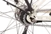 A close-up view of the rear wheel and drivetrain of a bicycle. Produktbild-Vorschau