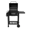 A black charcoal grill with its lid and front door open, shown on a white background. Produktbild-Vorschau