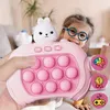 A child is smiling and playing with a pink rabbit-themed pop-it game controller. Produktbild-Vorschau