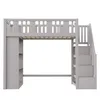 A grey loft bed with stairs and shelves, shown from the front against a white background. Náhled obrázku produktu