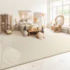 A bedroom decorated in a bohemian style with a bed, furniture, and a large rug. Produktbild-Vorschau