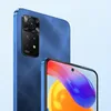A close-up marketing shot of a blue smartphone, showing its rear camera module and a portion of its screen. Náhled obrázku produktu