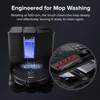 A robotic vacuum cleaner docking station with a close-up of its cleaning brush. Produktbild-Vorschau