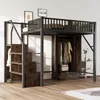 A loft bed with a wardrobe and stairs, set up in a room with wooden flooring and framed pictures on the wall. Podgląd zdjęcia produktu