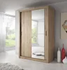 A wardrobe with mirrored doors in a room setting. Voir les images du produit