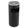 A black cylindrical outdoor trash can with a silver grate top and a cutout for waste disposal. Voir les images du produit