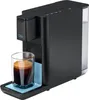 A black coffee machine with a glass of coffee on a blue mat. Produktbild-Vorschau