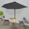An outdoor patio set with a table, two chairs, and a large umbrella. Anteprima dell’immagine prodotto
