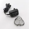 A black electric shaver charger and a gray shaver head are placed on a white background. Voir les images du produit
