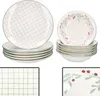 A set of plates and bowls with a grid pattern and a holly berry design. Podgląd zdjęcia produktu