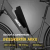 Close-up of an electric bicycle frame with a battery pack and text overlays highlighting features. Produktbild-Vorschau
