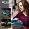 A woman is using a phone case with a kickstand feature. Produktbild-Vorschau