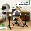 A woman is sitting at a height-adjustable desk in a home office setting. Náhľad obrázku produktu