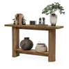 A wooden console table with decorative items on it and on the shelf below. Podgląd zdjęcia produktu