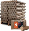A large stack of compressed wood briquettes on a pallet, with a smaller package and a single briquette in the foreground. Produktbild-Vorschau