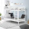 A white bunk bed with bedding and pillows in a room with light blue walls and a rug. Produktbild-Vorschau