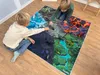 SkippiDoo Spielteppich Fantasy 120x120cm – 5 Welten mit Produktbild-Vorschau 4