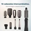 A collection of hair styling attachments and a hair dryer handle against a gradient background. Anteprima dell’immagine prodotto