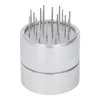 A close-up studio shot of a coffee needle distributor. Náhľad obrázku produktu