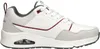 A side view of a single sneaker. Voir les images du produit