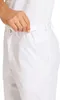 A close-up of a person's hand adjusting the waistband of white pants. Produktbild-Vorschau