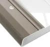Close-up of a metal stair nosing profile with a textured surface and a small circular indentation. Anteprima dell’immagine prodotto