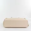 The bottom view of a beige handbag. Produktbild-Vorschau