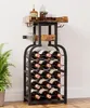 A wine rack filled with wine bottles and glasses, with a plant in the foreground. Anteprima dell’immagine prodotto