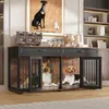 Two dogs are inside a large, multi-compartment dog crate that is part of a furniture piece. The furniture piece has drawers and a wooden top. There are bags of dog food on top of the furniture. Produktbild-Vorschau