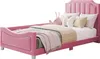 A pink upholstered bed with pillows and a stuffed animal on a white background. Náhľad obrázku produktu