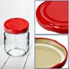 A collage of images showing a glass jar with a red lid, a close-up of the lid, and a close-up of the inside of the lid. Podgląd zdjęcia produktu