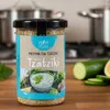 Physis of Crete Tzatziki Gewürz Glas neben frischer Gurke Produktbild-Vorschau