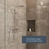 A modern shower system installed in a tiled shower stall. Produktbild-Vorschau