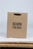 24er Set Geschenktüten aus Kraftpapier mit Sprüchen – Produktbild-Vorschau 12