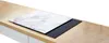 A marble-patterned glass stove top cover is placed on a black induction hob, which is on a wooden countertop. Anteprima dell’immagine prodotto