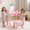 Two young girls are playing with a pink toy vanity set. Podgląd zdjęcia produktu