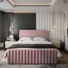 A bedroom scene featuring a pink upholstered bed. Produktbild-Vorschau
