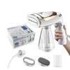 A handheld steam brush and its accessories are displayed on a white background, with the product's packaging also visible. Produktbild-Vorschau