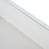 A close-up view of a white surface with a subtle shadow line, suggesting a furniture edge or corner. Anteprima dell’immagine prodotto