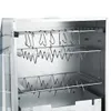 Interior view of a smoker with racks and hooks. Voir les images du produit