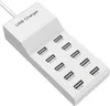 A white USB charger with multiple ports is shown on a white background. Náhled obrázku produktu