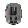 The back view of a gray and red battery pack for a power tool. Produktbild-Vorschau