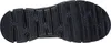 The image shows the sole of a black shoe. Voir les images du produit