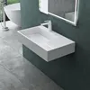 A modern bathroom with a wall-mounted sink and a freestanding bathtub. Produktbild-Vorschau