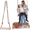 A collage showing a wooden swing set and a mother and child on a swing. Náhľad obrázku produktu