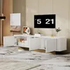 A modern living room with a white TV stand and a large TV mounted on the wall. Anteprima dell’immagine prodotto