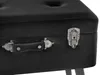 A close-up view of a black storage ottoman with a tufted top, featuring a leather handle and a silver latch. Náhled obrázku produktu